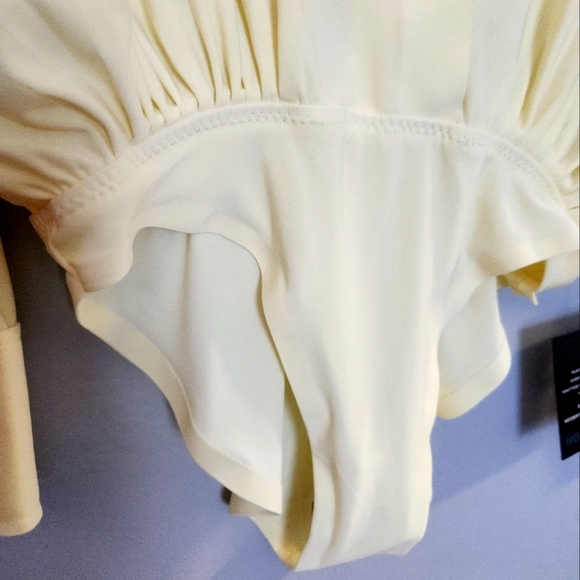 NWT Norma Kamali Oversized Boyfriend Style V Neck Bodysuit Butter XS - Picture 7 of 11